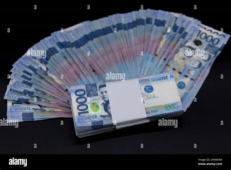 1 thousand Philippine pesos to Singapore dollars .